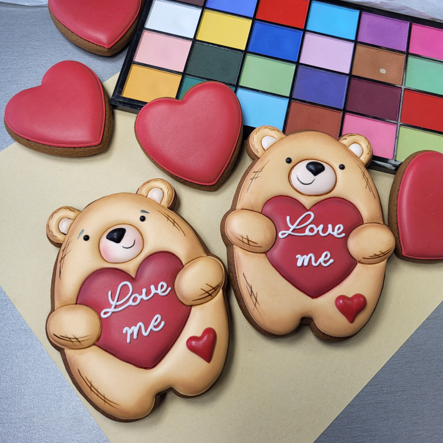 Valentine teddy bear cookies holding heart with Love me message