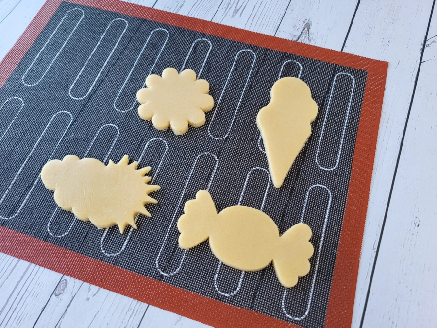 Custom cookie shapes made using paper templates