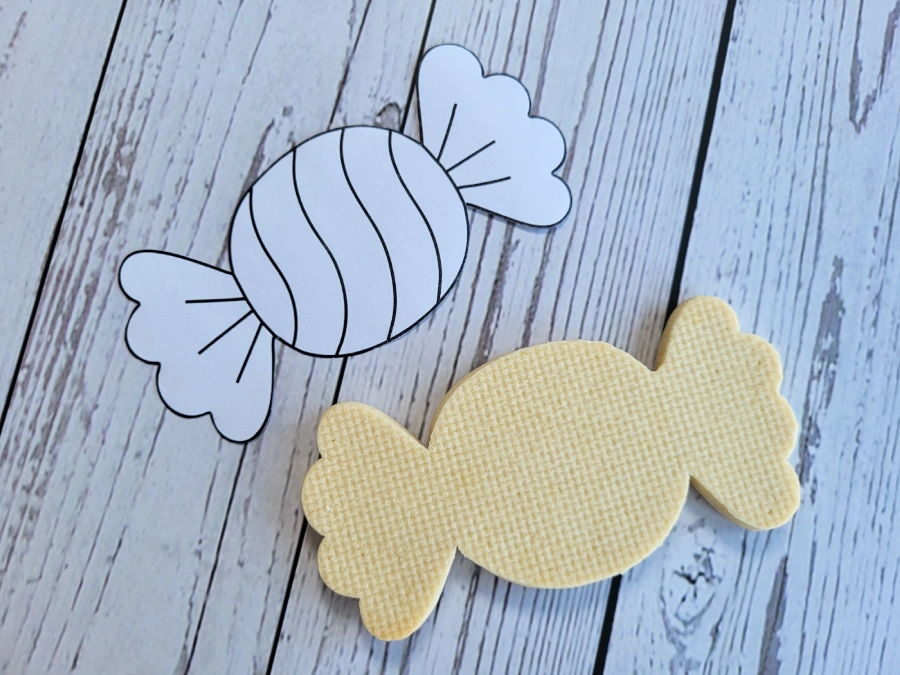 Paper template next to a matching cookie shape