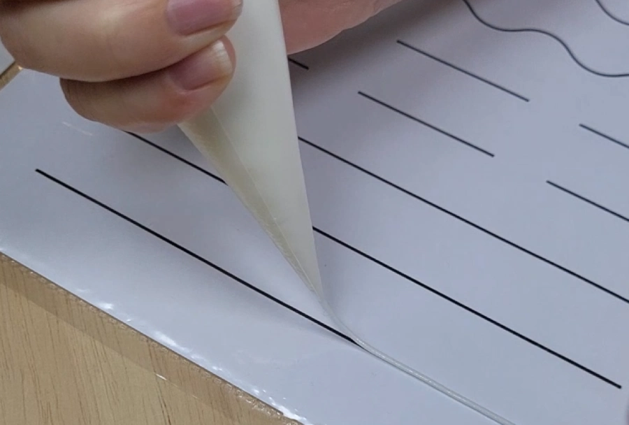 Practicing straight icing lines with a piping cone