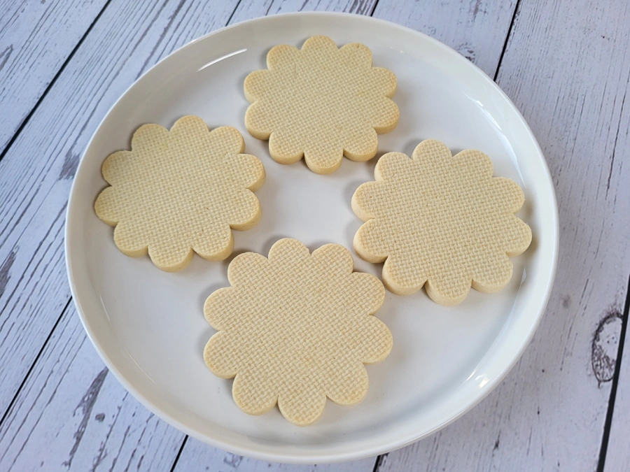 Smooth sugar cookies with clean edges ready for decorating