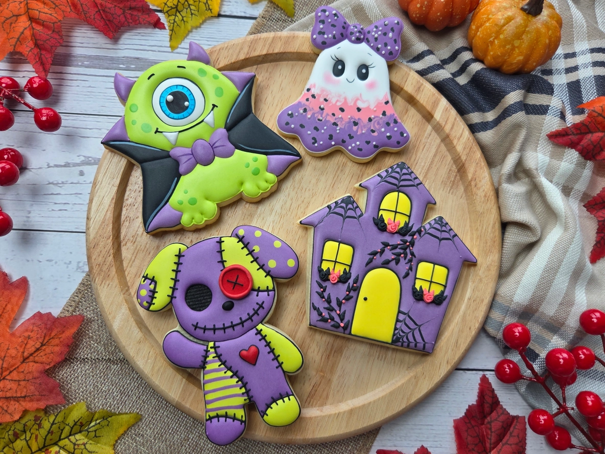 Decorated royal icing cookies by Cookie Icing Lab